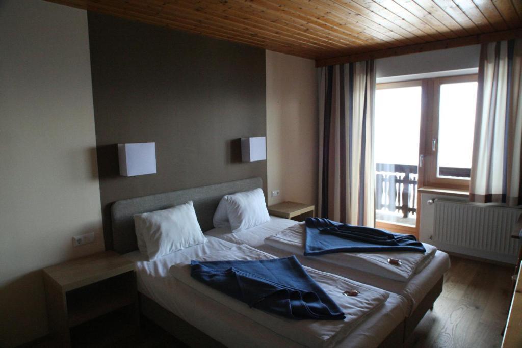 Sattleggers Alpenhof & Feriensternwarte Hotel Greifenburg Quarto foto